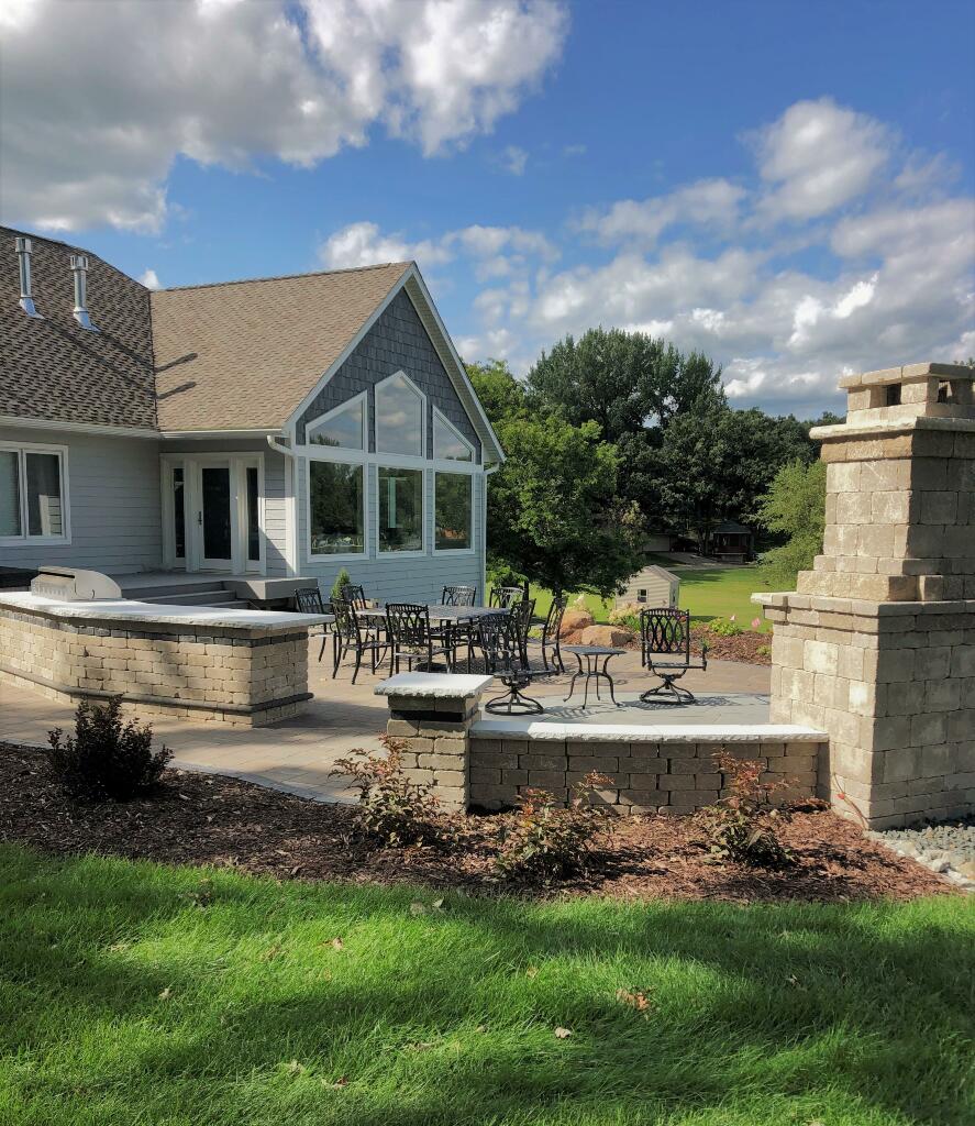 Outdoor Room with Fireplace and Kitchen by Sequoia Landscape