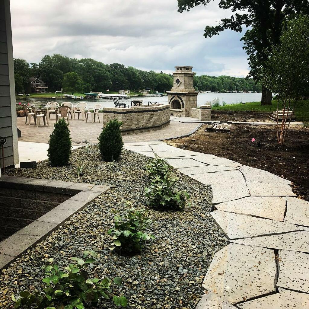 Bluestone Walk Outdoor Living Overlooking Lake by Sequoia Landscape