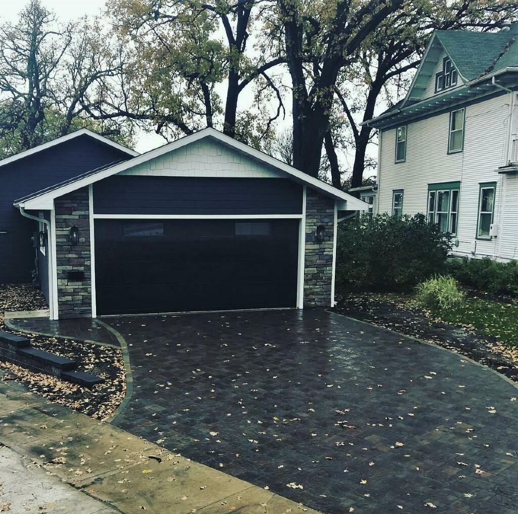 Dark Permeable Pavers in Driveway by Sequoia Landscape